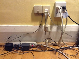Plug everything else in here, then find a bare wall outlet for the range extender "router" unit.